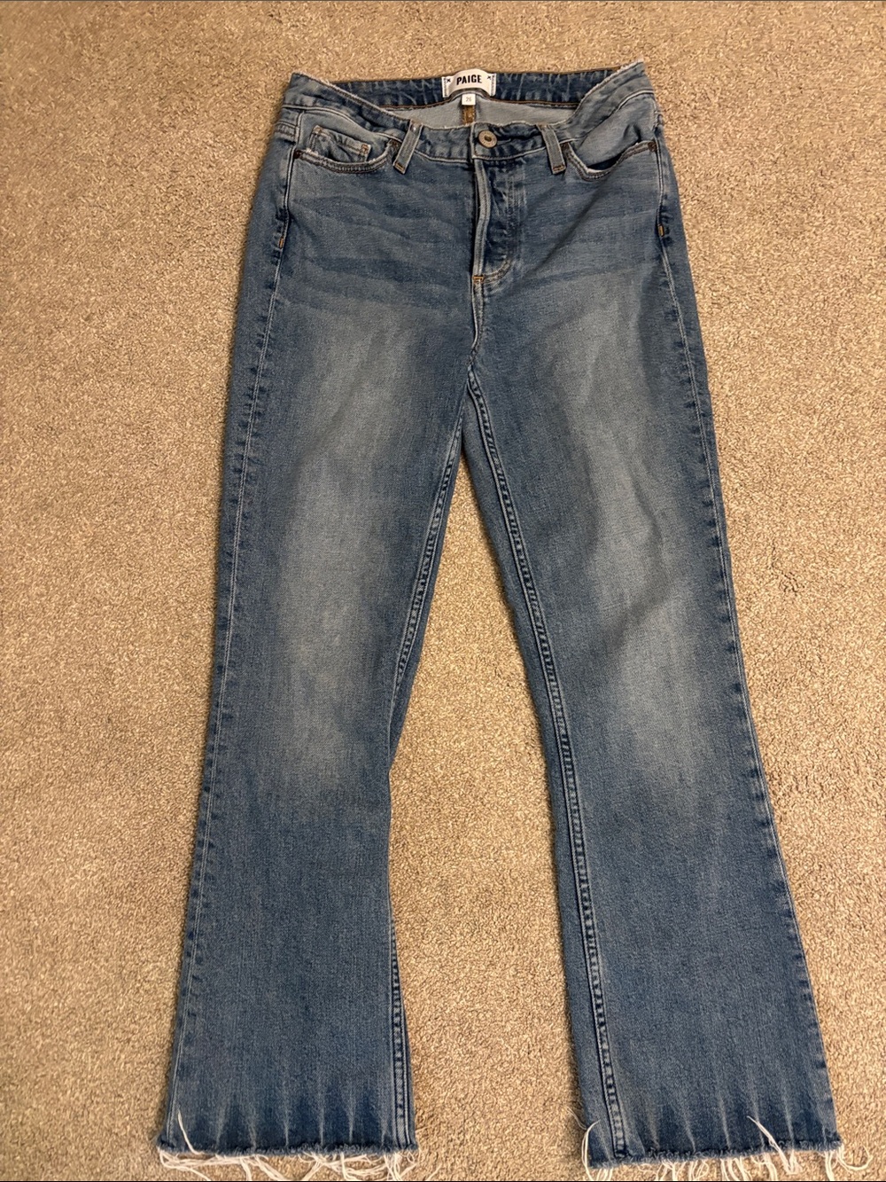 PAIGE Medium Blue Flared Jeans with Frayed Hem